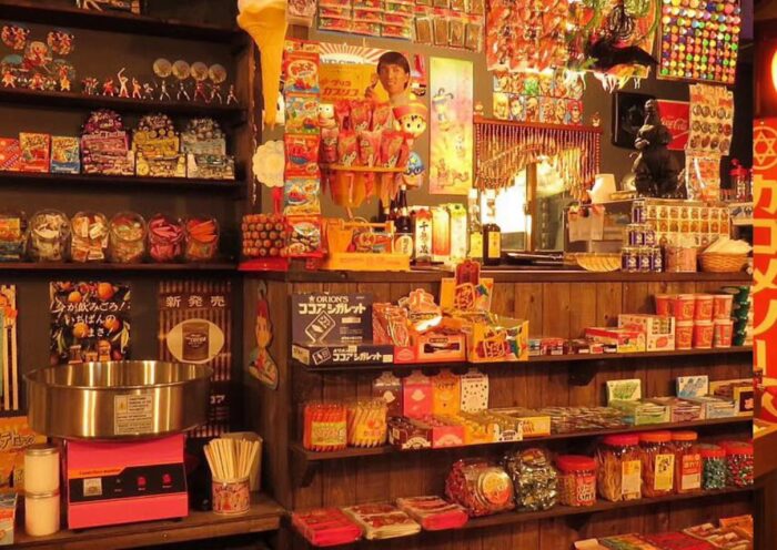 A retro dagashi shop packed with colorful candies and nostalgic toys.